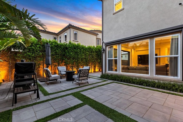 view of patio / terrace featuring fence