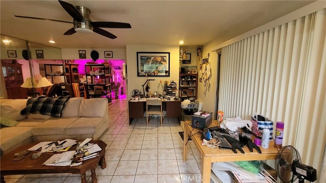 living area with a ceiling fan and recessed lighting