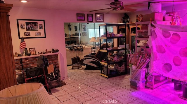 storage area featuring a ceiling fan
