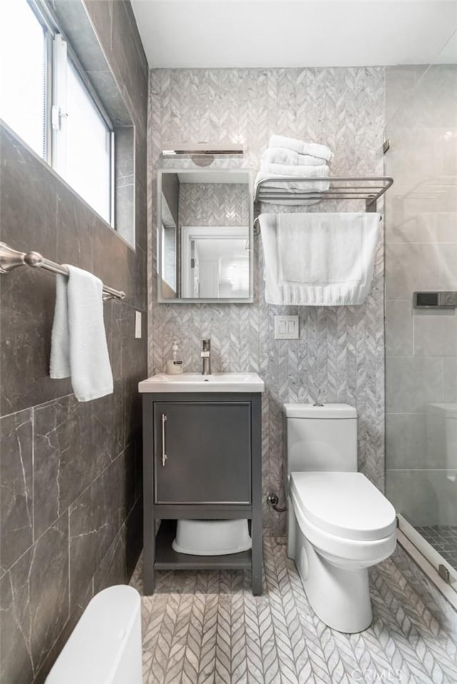 1742 Dixon St, Redondo Beach, CA 90278 - full bathroom with toilet, tile walls, vanity, and a tile shower