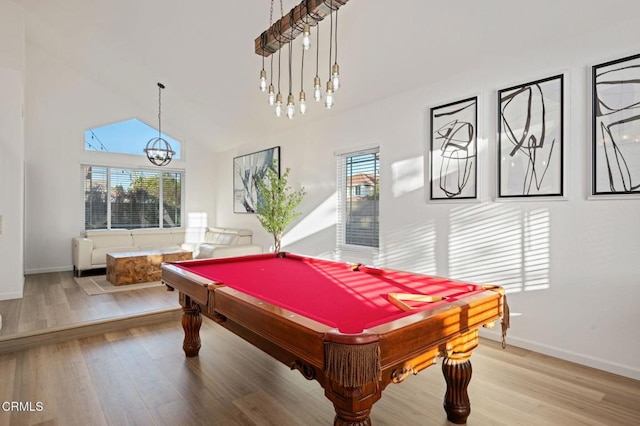 800 Coronado Pl, Oxnard, CA 93030 - rec room with a chandelier, plenty of natural light, wood finished floors, baseboards, and high vaulted ceiling