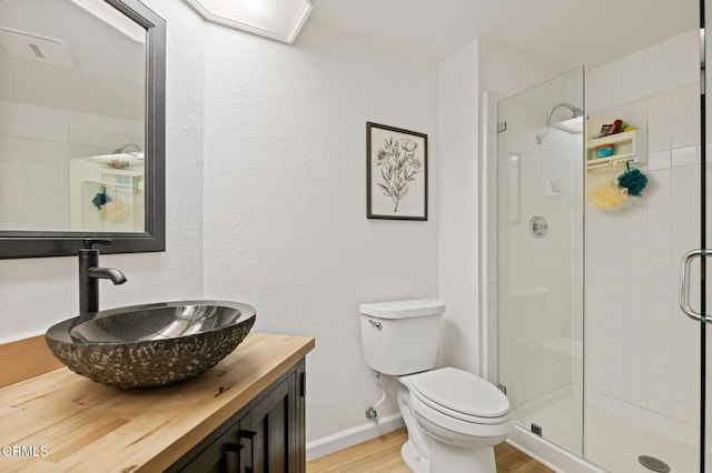800 Coronado Pl, Oxnard, CA 93030 - full bath featuring a stall shower, wood finished floors, toilet, baseboards, and vanity