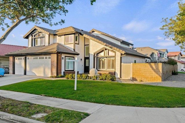 800 Coronado Pl, Oxnard, CA 93030 - view of front of house featuring driveway, a tile roof, and brick siding