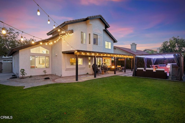 800 Coronado Pl, Oxnard, CA 93030 - rear view of property with outdoor lounge area, stucco siding, a patio area, and a yard