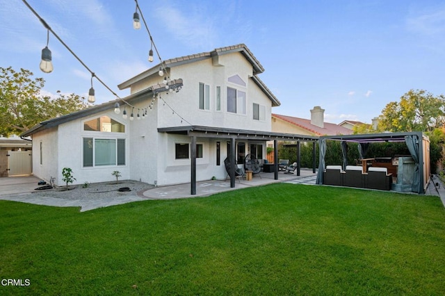 800 Coronado Pl, Oxnard, CA 93030 - back of property with outdoor lounge area, stucco siding, and a patio area