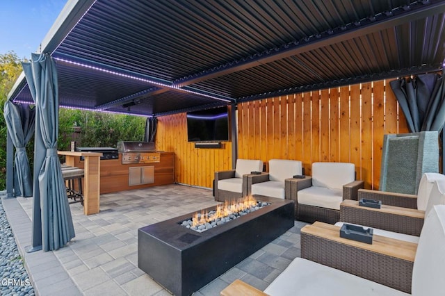 800 Coronado Pl, Oxnard, CA 93030 - view of patio with grilling area, exterior kitchen, an outdoor bar, and an outdoor living space with a fire pit