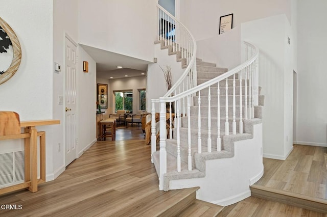 800 Coronado Pl, Oxnard, CA 93030 - stairs with wood finished floors, a towering ceiling, and baseboards