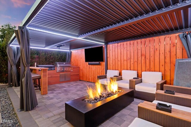 800 Coronado Pl, Oxnard, CA 93030 - view of patio with a fire pit, a grill, and exterior kitchen