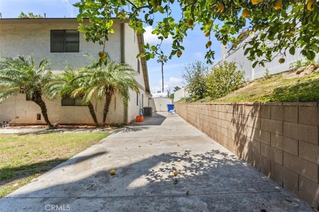 22833 Finch St, Grand Terrace, CA 92313 - view of property exterior featuring stucco siding, fence, and cooling unit