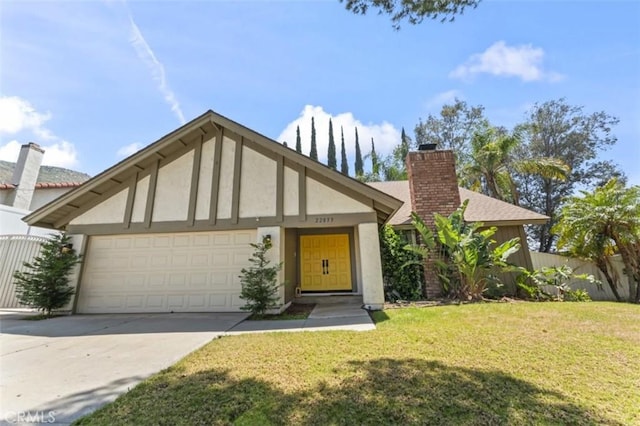 22833 Finch St, Grand Terrace, CA 92313 - view of front of property featuring stucco siding, driveway, a garage, and a chimney