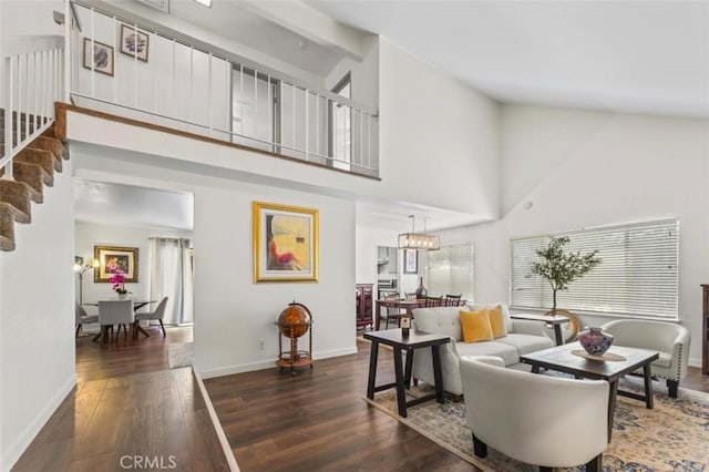 22833 Finch St, Grand Terrace, CA 92313 - living room with wood finished floors, high vaulted ceiling, baseboards, and stairway