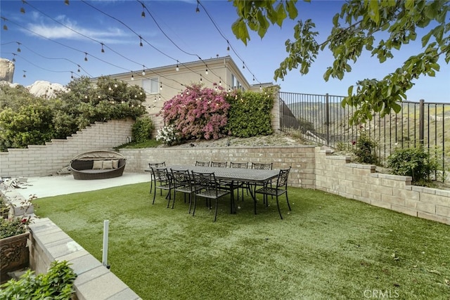 view of yard with a patio area and a fire pit