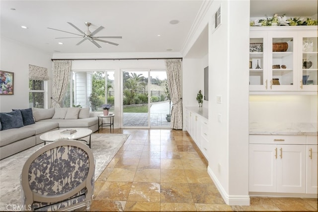 living room with ceiling fan, crown molding, and recessed lighting