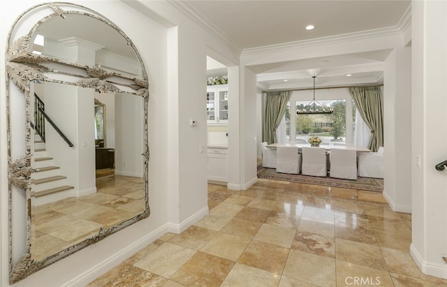 hallway featuring ornamental molding, baseboards, a chandelier, recessed lighting, and stairway