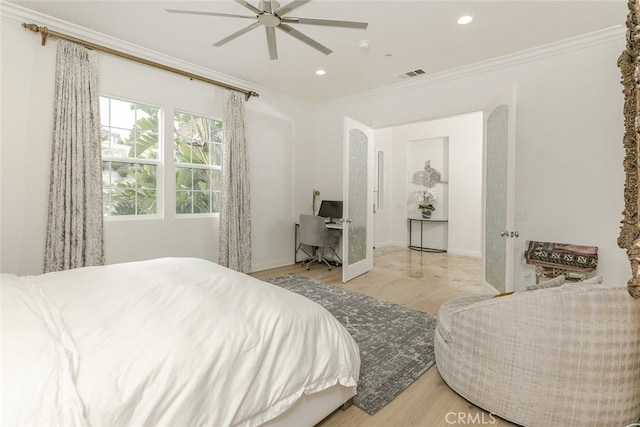 bedroom with wood finished floors, ornamental molding, recessed lighting, baseboards, and a desk