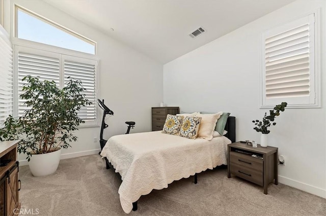 1545 Winding Sun Dr, Beaumont, CA 92223 - bedroom featuring light colored carpet, vaulted ceiling, and baseboards