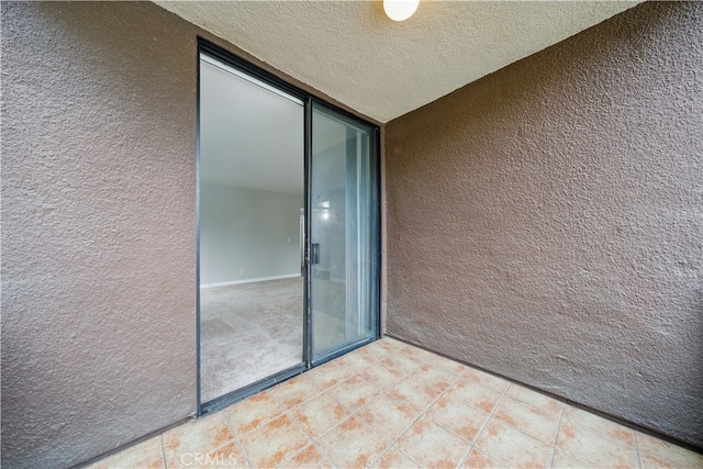 7826 Topanga Canyon Blvd Unit 218, Canoga Park, CA 91304 - view of patio with a balcony
