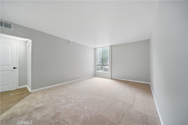 7826 Topanga Canyon Blvd Unit 218, Canoga Park, CA 91304 - carpeted empty room with baseboards