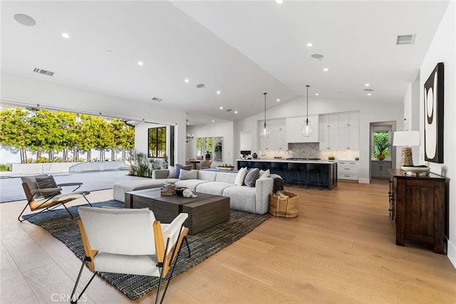 1530 Anita Ln, Newport Beach, CA 92660 - living room featuring light wood-style floors, plenty of natural light, high vaulted ceiling, and recessed lighting