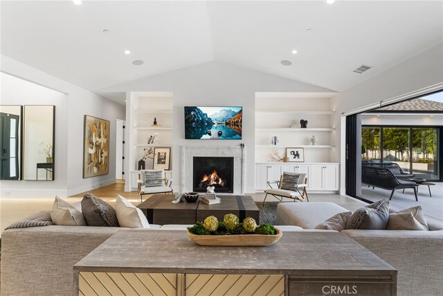 1530 Anita Ln, Newport Beach, CA 92660 - living area with lofted ceiling, built in shelves, a fireplace, and recessed lighting