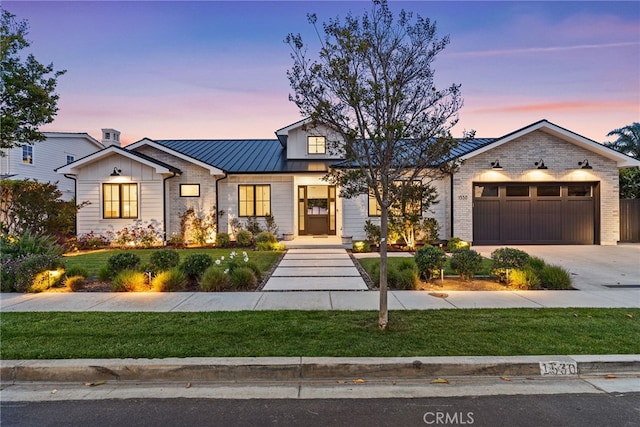 1530 Anita Ln, Newport Beach, CA 92660 - modern farmhouse style home with a garage, driveway, a standing seam roof, and a front yard