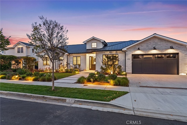 1530 Anita Ln, Newport Beach, CA 92660 - modern inspired farmhouse featuring a standing seam roof, a garage, concrete driveway, a lawn, and a metal roof