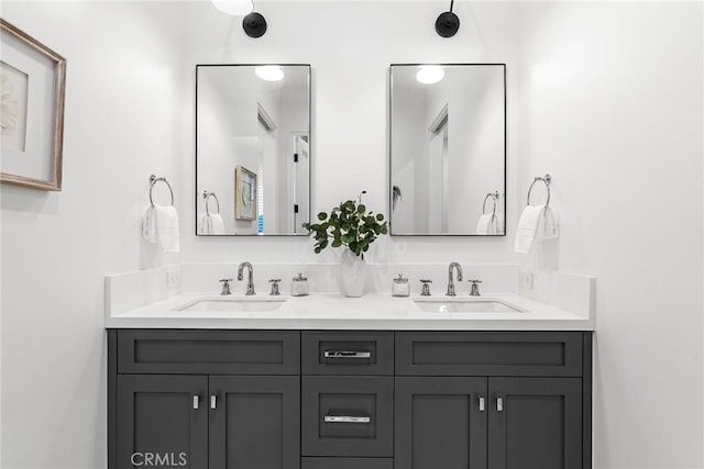 bathroom featuring double vanity