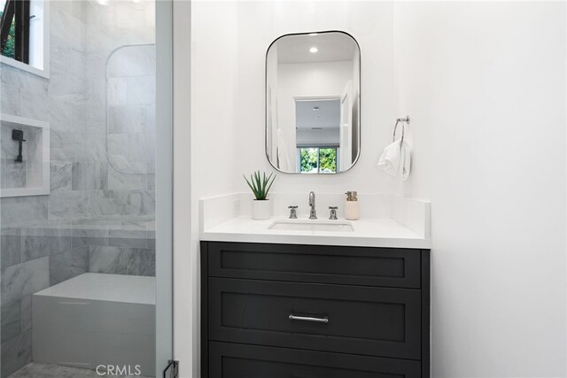 1530 Anita Ln, Newport Beach, CA 92660 - bathroom with vanity, a tile shower, and plenty of natural light