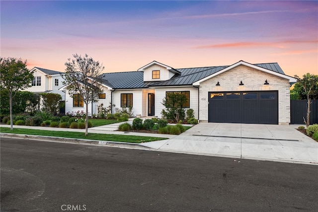 1530 Anita Ln, Newport Beach, CA 92660 - modern inspired farmhouse with a standing seam roof, a garage, concrete driveway, and a metal roof