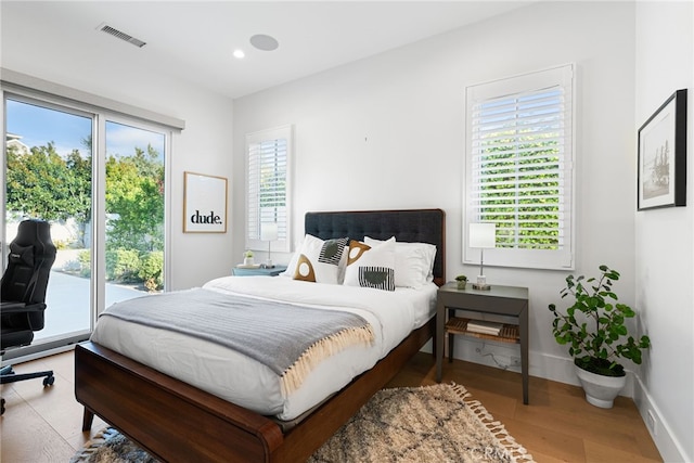 1530 Anita Ln, Newport Beach, CA 92660 - bedroom with access to exterior, wood finished floors, and recessed lighting