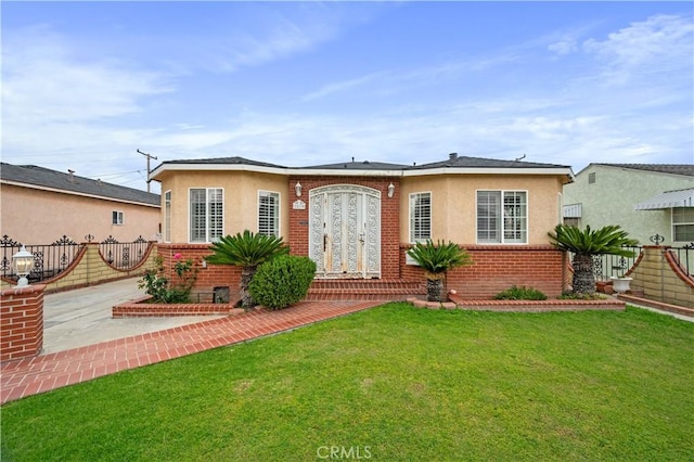 2870 Canal Ave, Long Beach, CA 90810 - view of front facade featuring brick siding and stucco siding