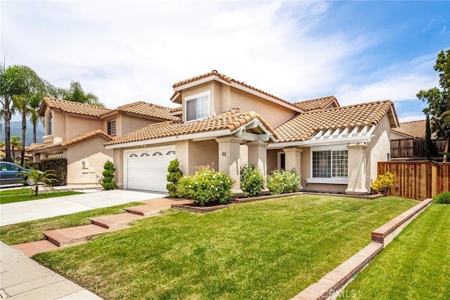 16 Allyssum, Rancho Santa Margarita, CA 92688 - mediterranean / spanish house featuring stucco siding, concrete driveway, and a garage