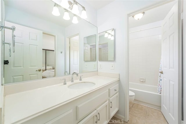 16 Allyssum, Rancho Santa Margarita, CA 92688 - ensuite bathroom featuring toilet, vanity, tile patterned flooring, and shower / tub combo