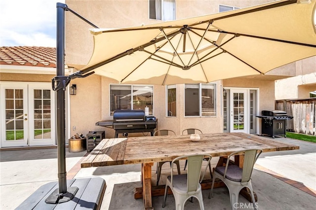 16 Allyssum, Rancho Santa Margarita, CA 92688 - view of patio / terrace with french doors, a grill, fence, and outdoor dining space