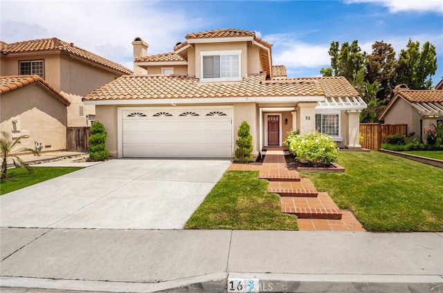16 Allyssum, Rancho Santa Margarita, CA 92688 - mediterranean / spanish-style home with stucco siding, concrete driveway, a tile roof, and a garage