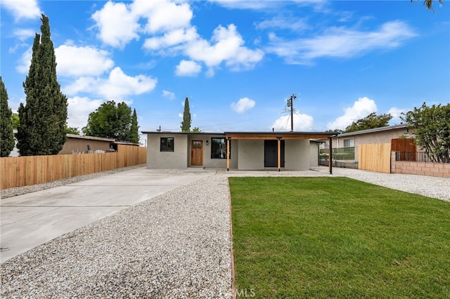 ranch-style house featuring stucco siding
