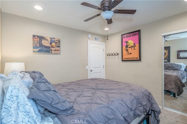 carpeted bedroom featuring a ceiling fan and recessed lighting