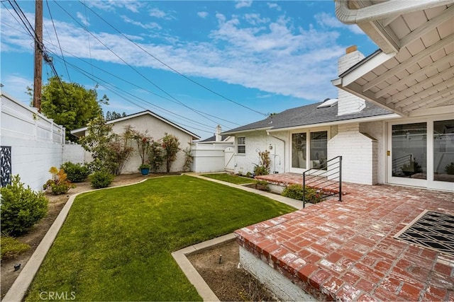 view of yard featuring a patio