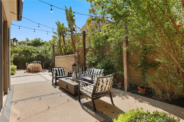 25 Tenderfoot, Irvine, CA 92602 - view of patio with a fire pit and a fenced backyard