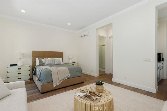 25 Tenderfoot, Irvine, CA 92602 - bedroom with crown molding, wood finished floors, baseboards, a wall unit AC, and recessed lighting