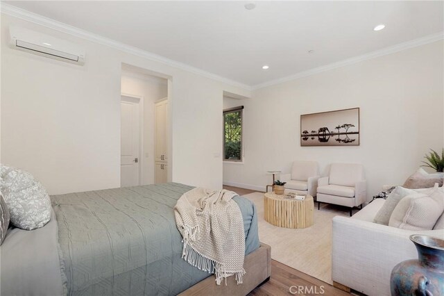 25 Tenderfoot, Irvine, CA 92602 - bedroom featuring wood finished floors, a wall unit AC, crown molding, recessed lighting, and baseboards