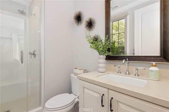 25 Tenderfoot, Irvine, CA 92602 - bathroom featuring toilet, a stall shower, crown molding, and vanity