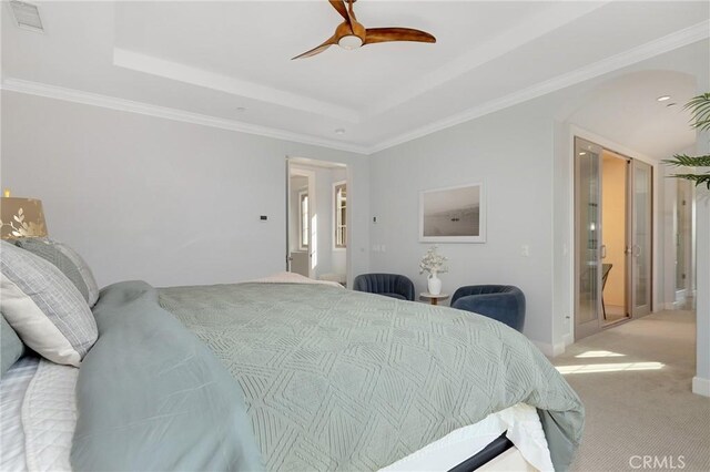 25 Tenderfoot, Irvine, CA 92602 - bedroom with a tray ceiling, light colored carpet, ceiling fan, and crown molding