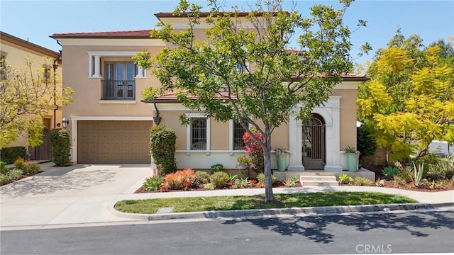 25 Tenderfoot, Irvine, CA 92602 - mediterranean / spanish house with concrete driveway, a garage, stucco siding, and french doors