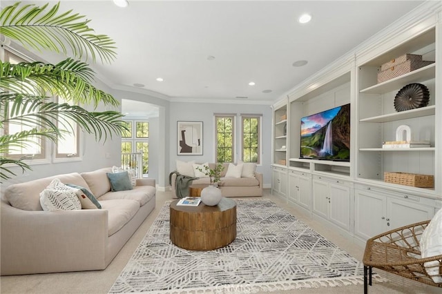 25 Tenderfoot, Irvine, CA 92602 - living room with crown molding, recessed lighting, built in features, baseboards, and arched walkways