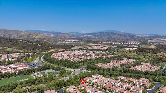 25 Tenderfoot, Irvine, CA 92602 - aerial view of property's location with a mountainous background and nearby suburban area