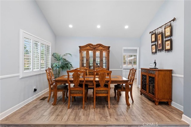 2247 Bella Ave, Upland, CA 91784 - dining room with wood finished floors, recessed lighting, baseboards, and high vaulted ceiling