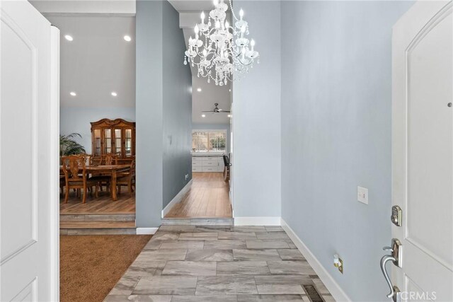 2247 Bella Ave, Upland, CA 91784 - corridor with recessed lighting, a chandelier, and baseboards