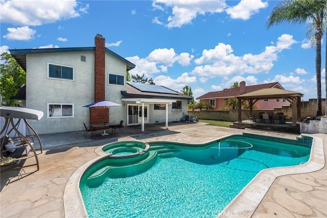 2247 Bella Ave, Upland, CA 91784 - view of pool with a gazebo, a patio area, a fenced backyard, outdoor dining area, and a pool with connected hot tub