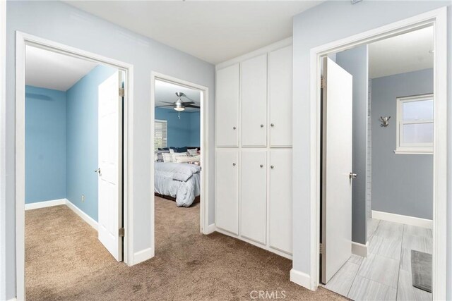 2247 Bella Ave, Upland, CA 91784 - hall featuring light carpet and baseboards
